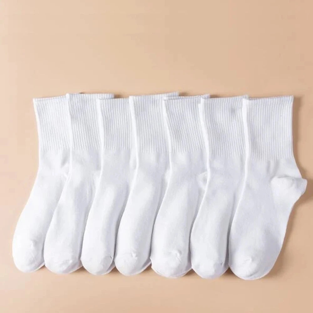 7 Pairs of Women's Classic Black and White Solid Color Casual Socks