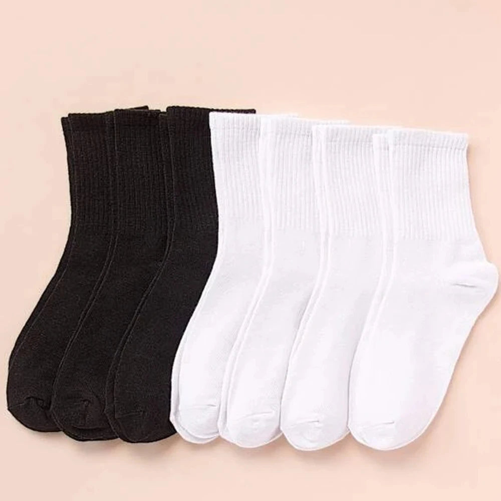 7 Pairs of Women's Classic Black and White Solid Color Casual Socks